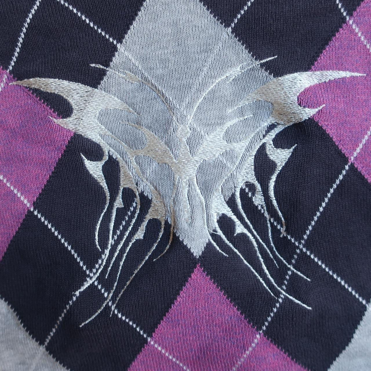 Embroidered upcycled sweater